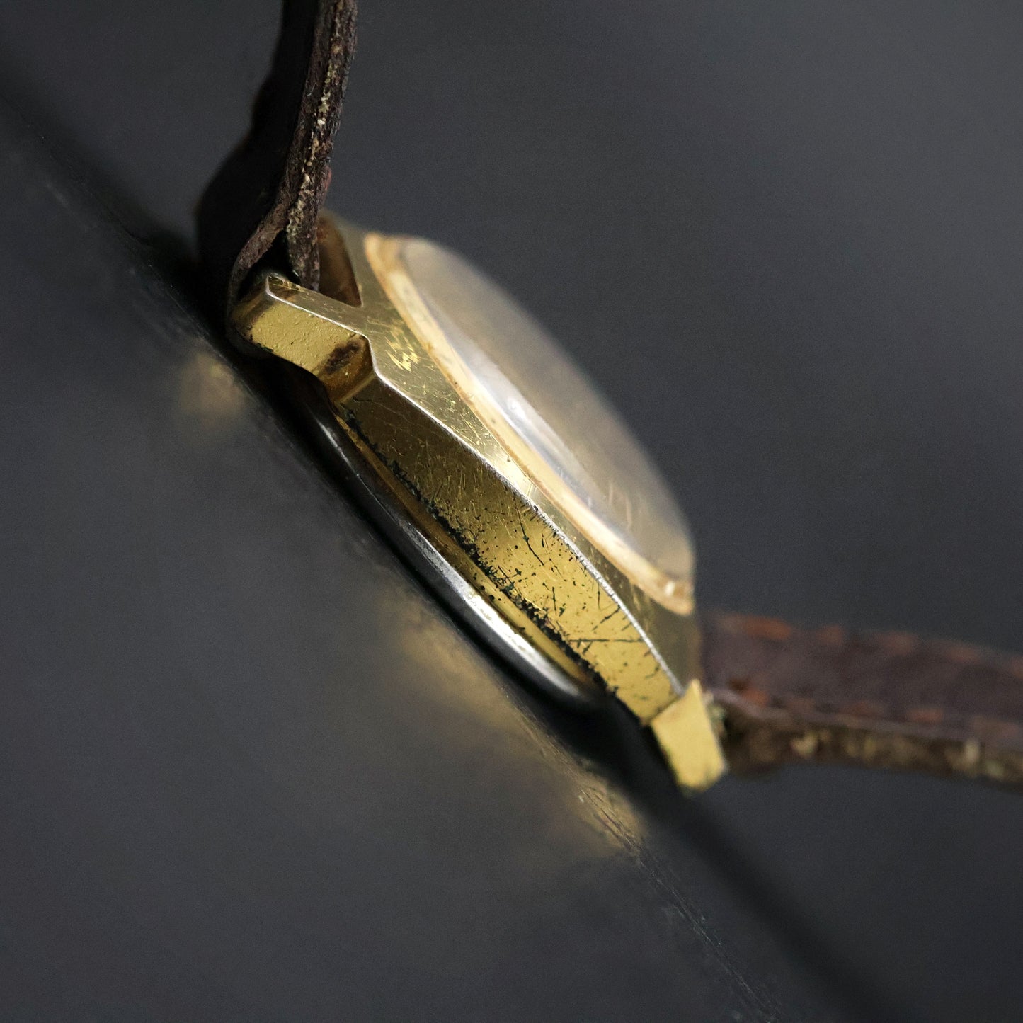 Timex Gold Cushion-Case on Brown Leather