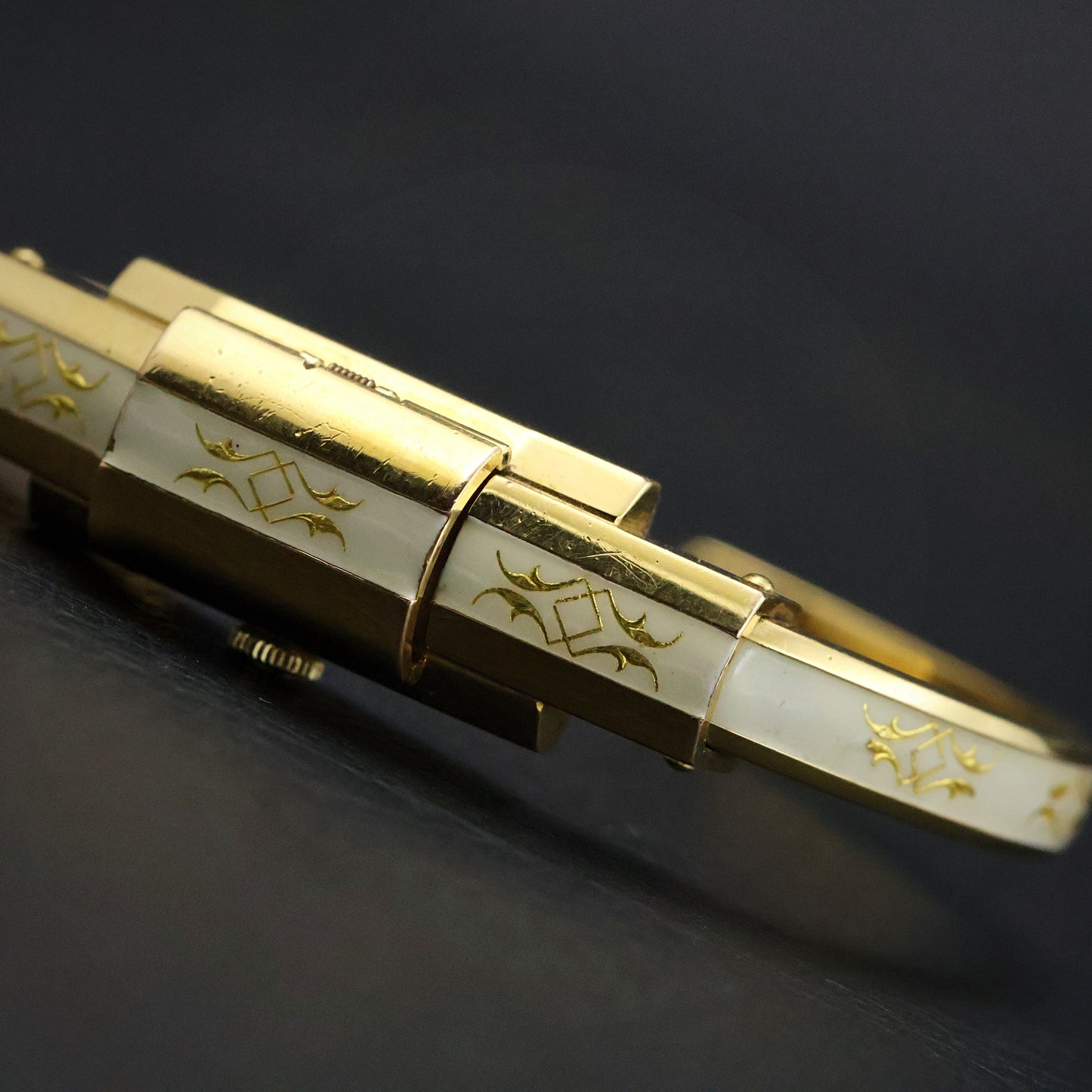 Huguenin White Enamel Gold Scroll Bangle Watch