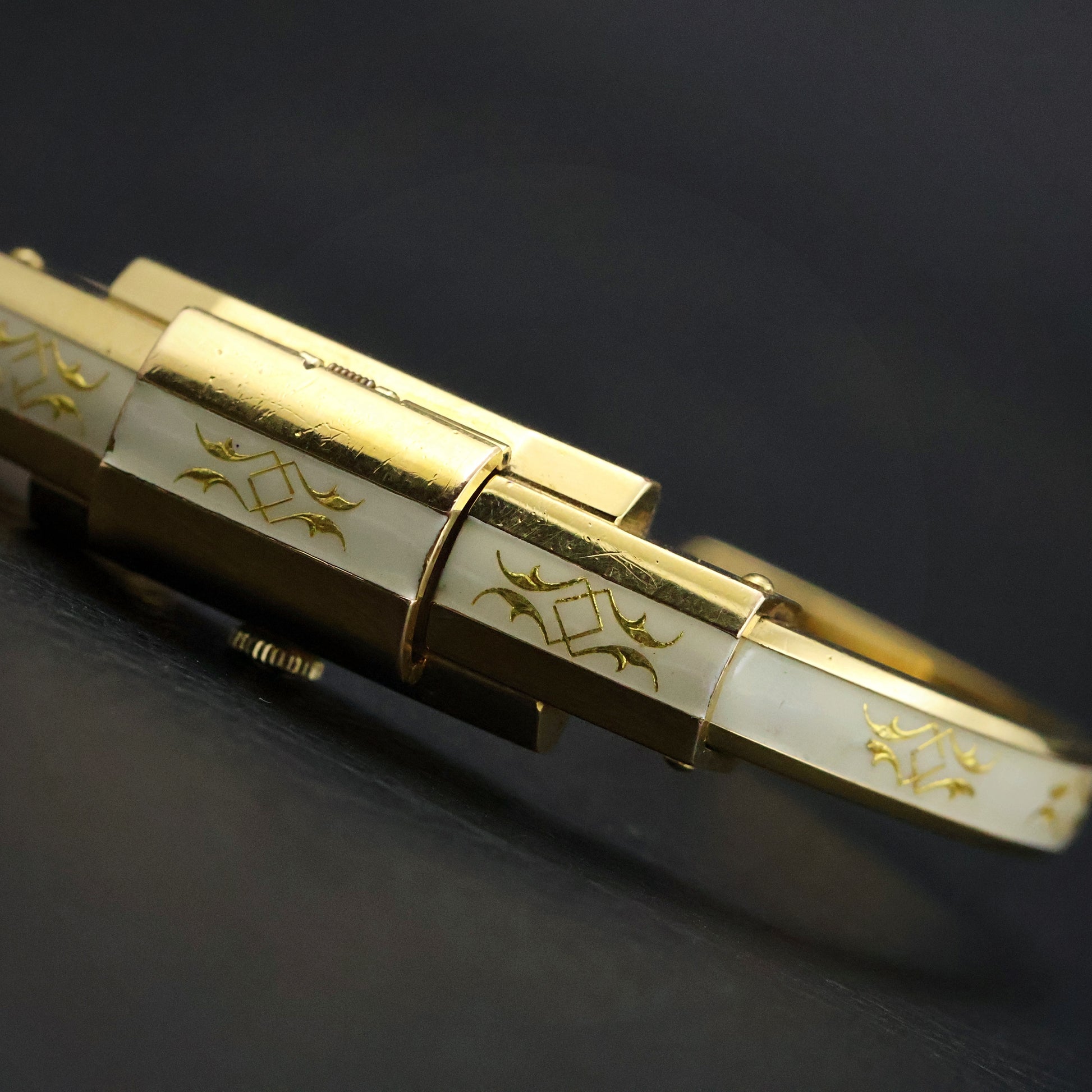 Huguenin White Enamel Gold Scroll Bangle Watch