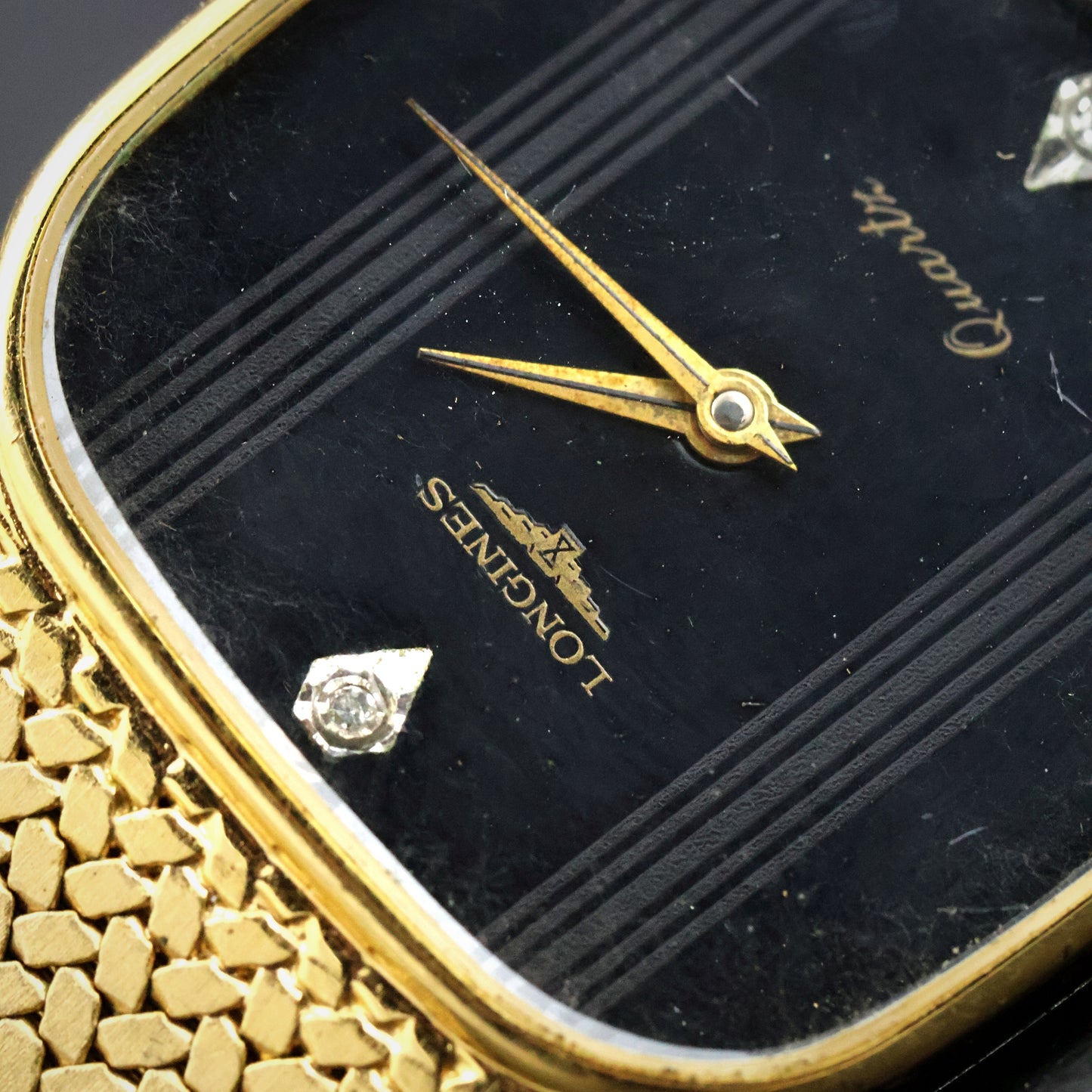 Longines Black Diamond Dial Gold Mesh Watch
