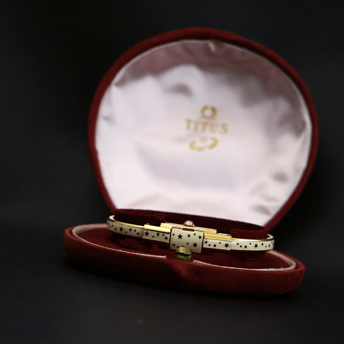 Titus Ladies Concealed-Dial Bangle Watch | White Enamel Star Pattern | Original Box