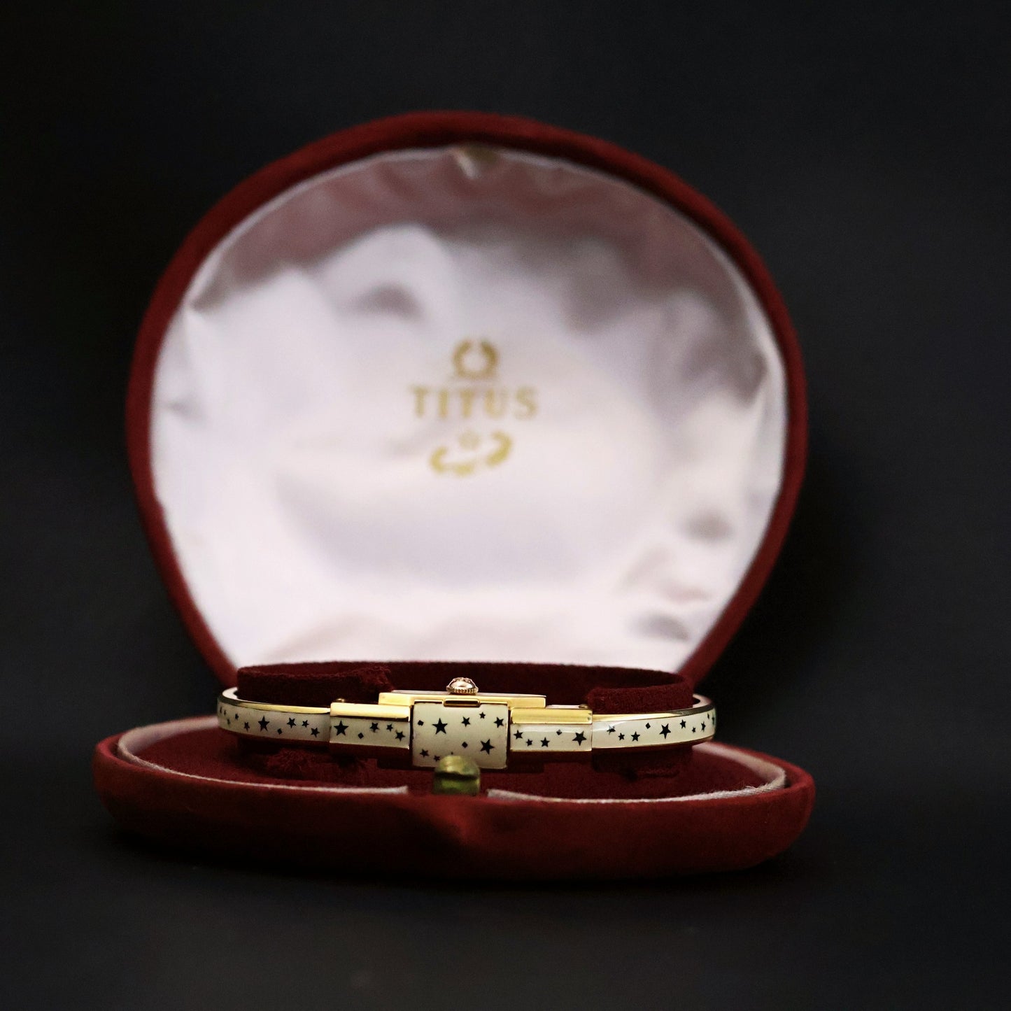 Titus Ladies Concealed-Dial Bangle Watch | White Enamel Star Pattern | Original Box