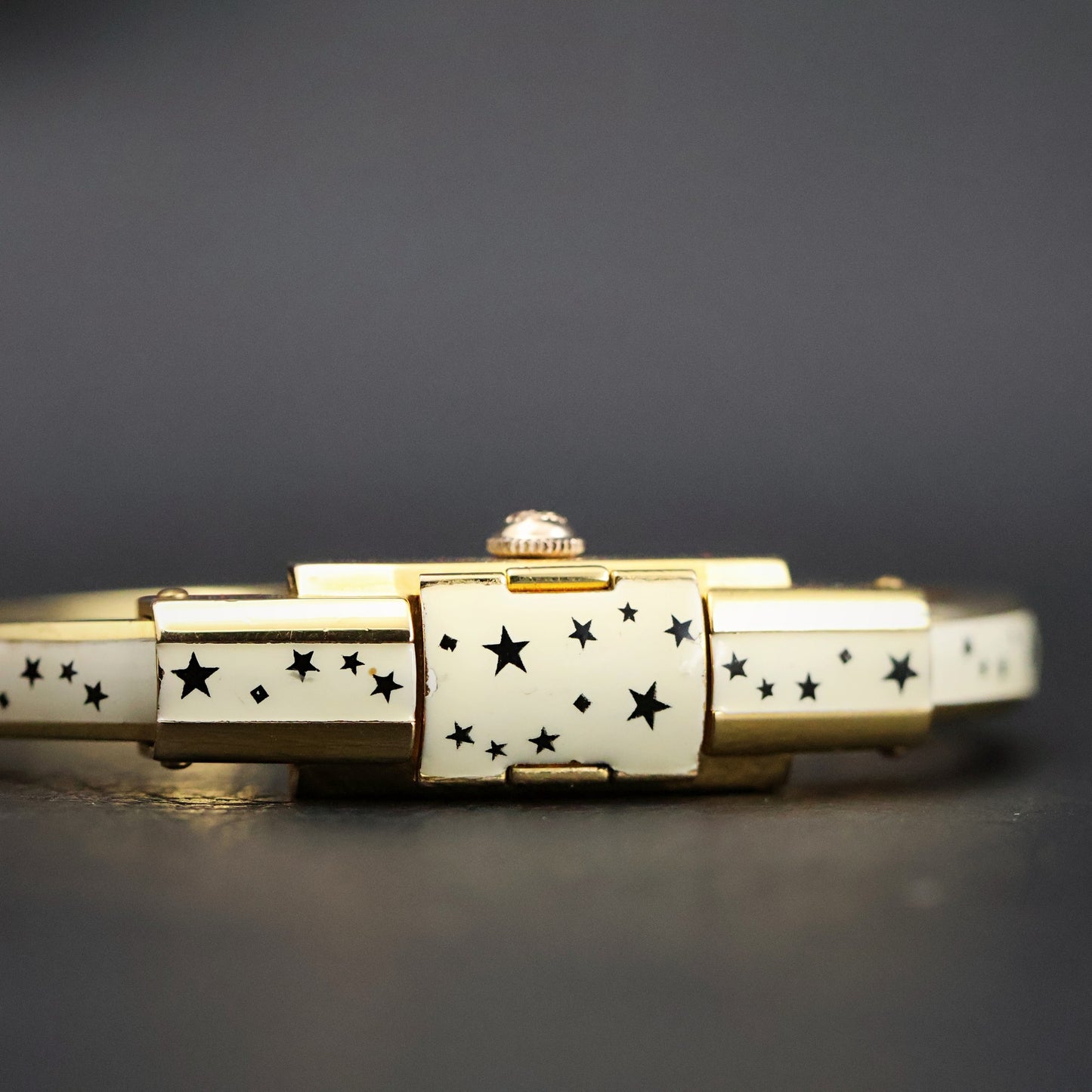 Titus Ladies Concealed-Dial Bangle Watch | White Enamel Star Pattern | Original Box