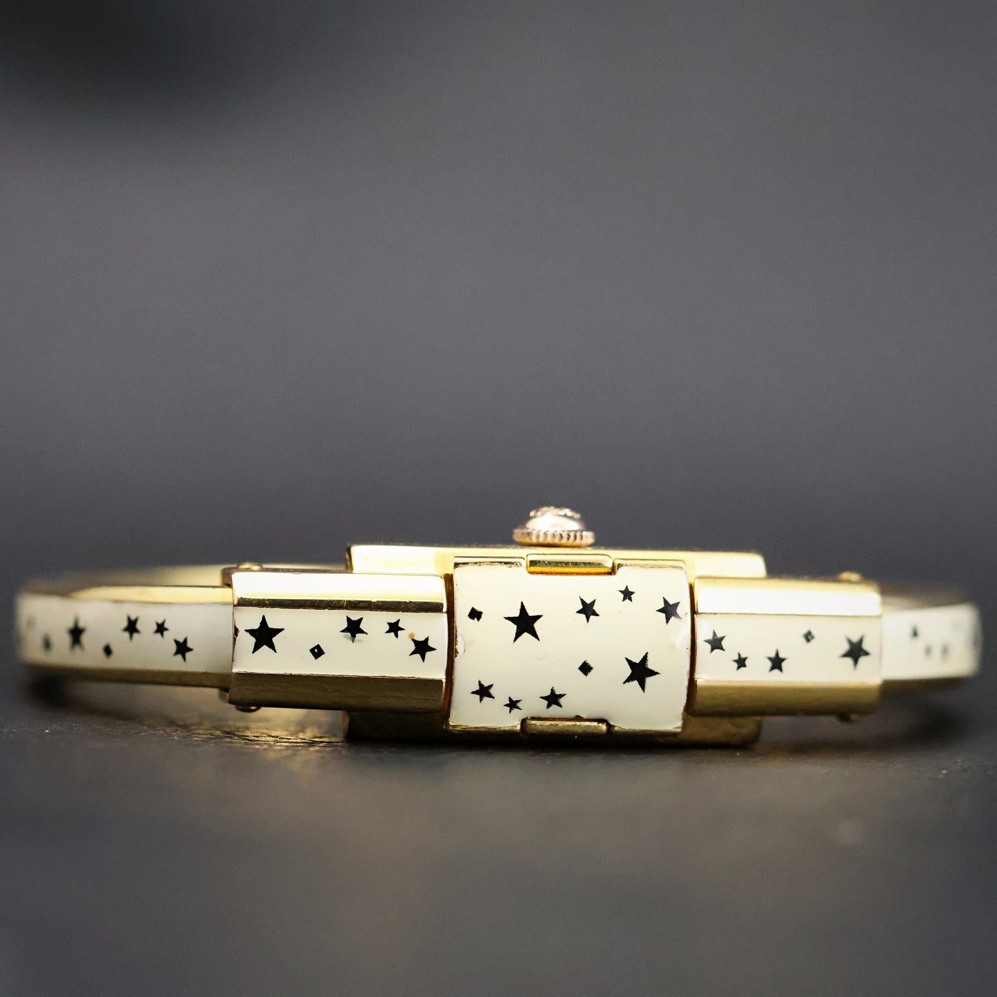 Titus Ladies Concealed-Dial Bangle Watch | White Enamel Star Pattern | Original Box