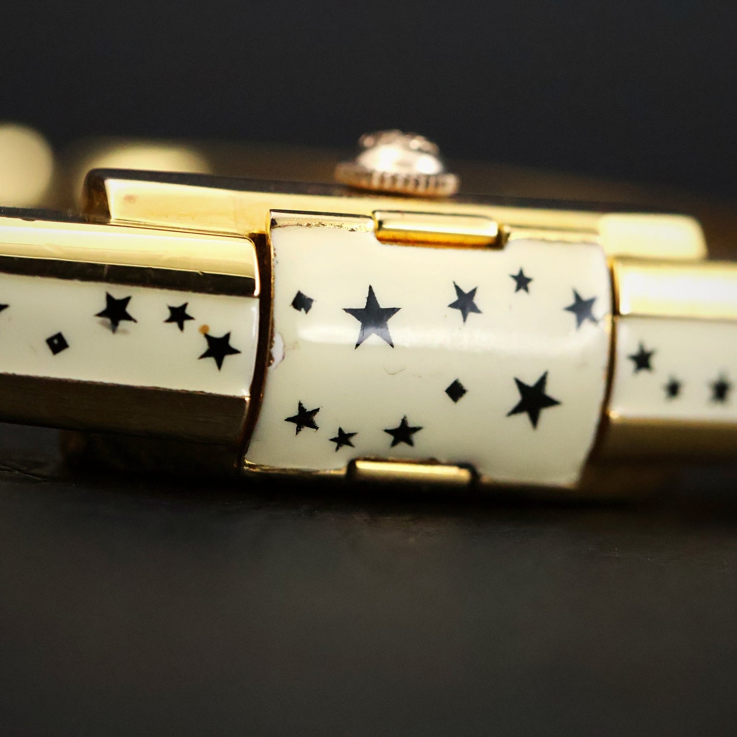 Titus Ladies Concealed-Dial Bangle Watch | White Enamel Star Pattern | Original Box