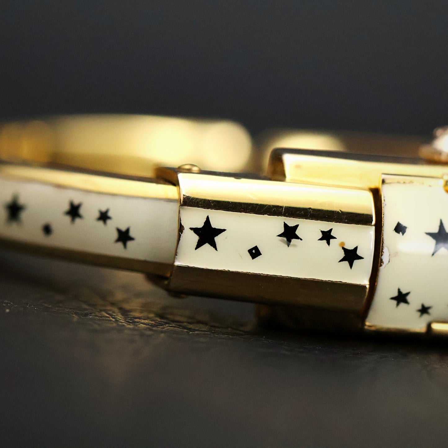Titus Ladies Concealed-Dial Bangle Watch | White Enamel Star Pattern | Original Box
