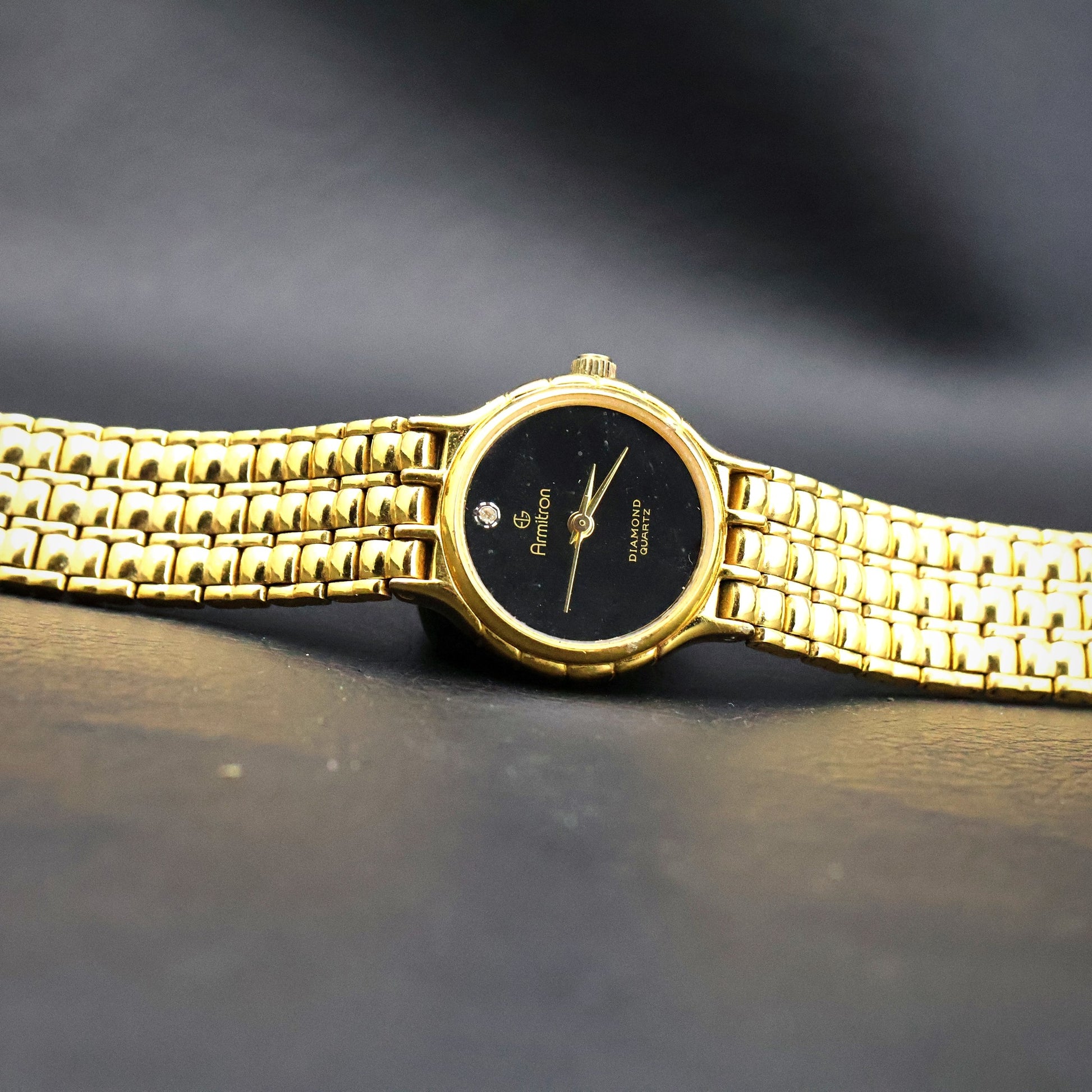 Armitron Diamond Quartz | Gold Tone | Black Dial