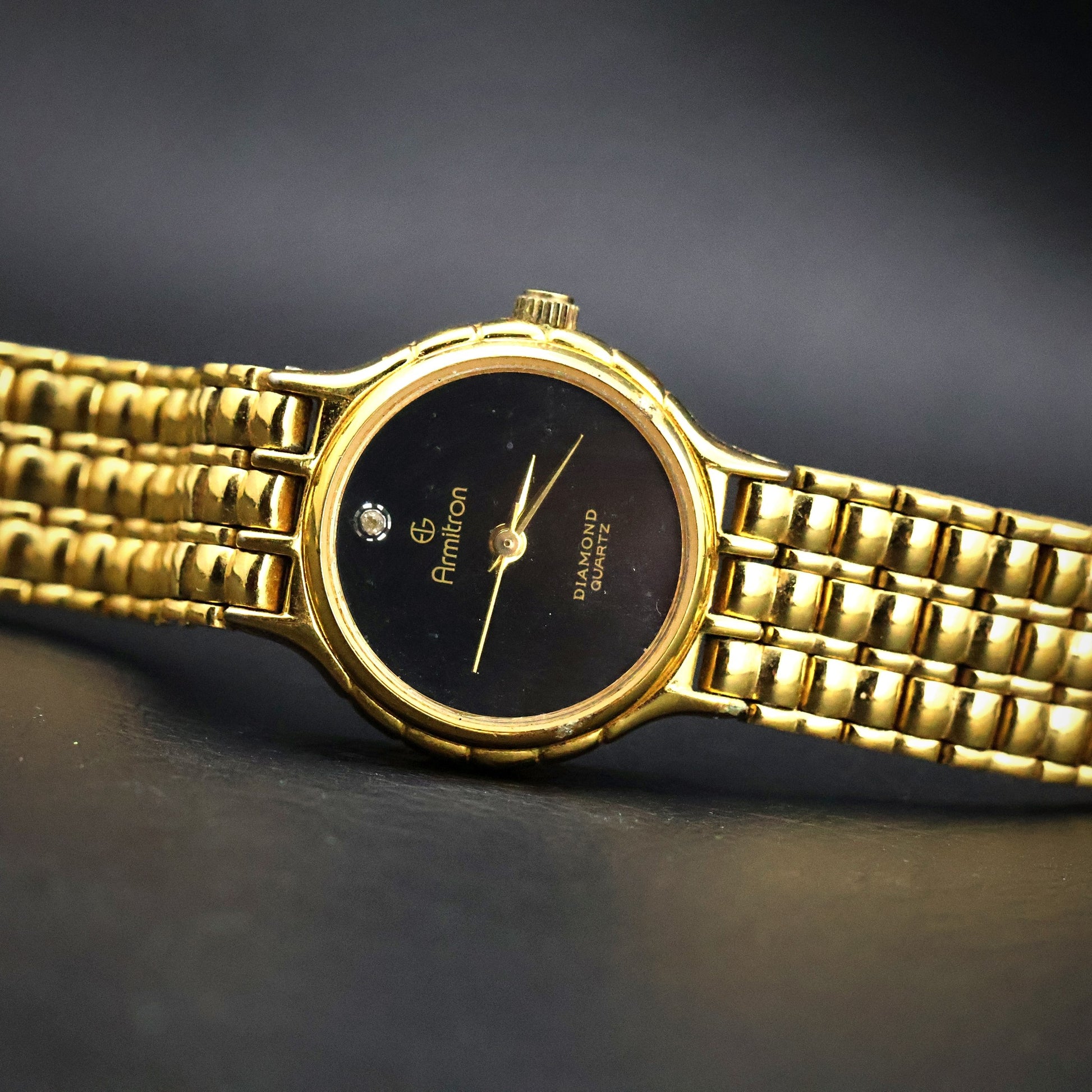 Armitron Diamond Quartz | Gold Tone | Black Dial
