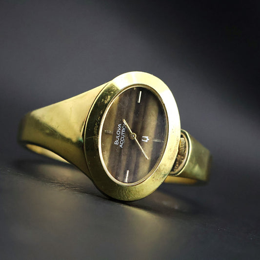 Bulova Accutron | Gold Cuff Bangle | Tigers Eye Style Dial