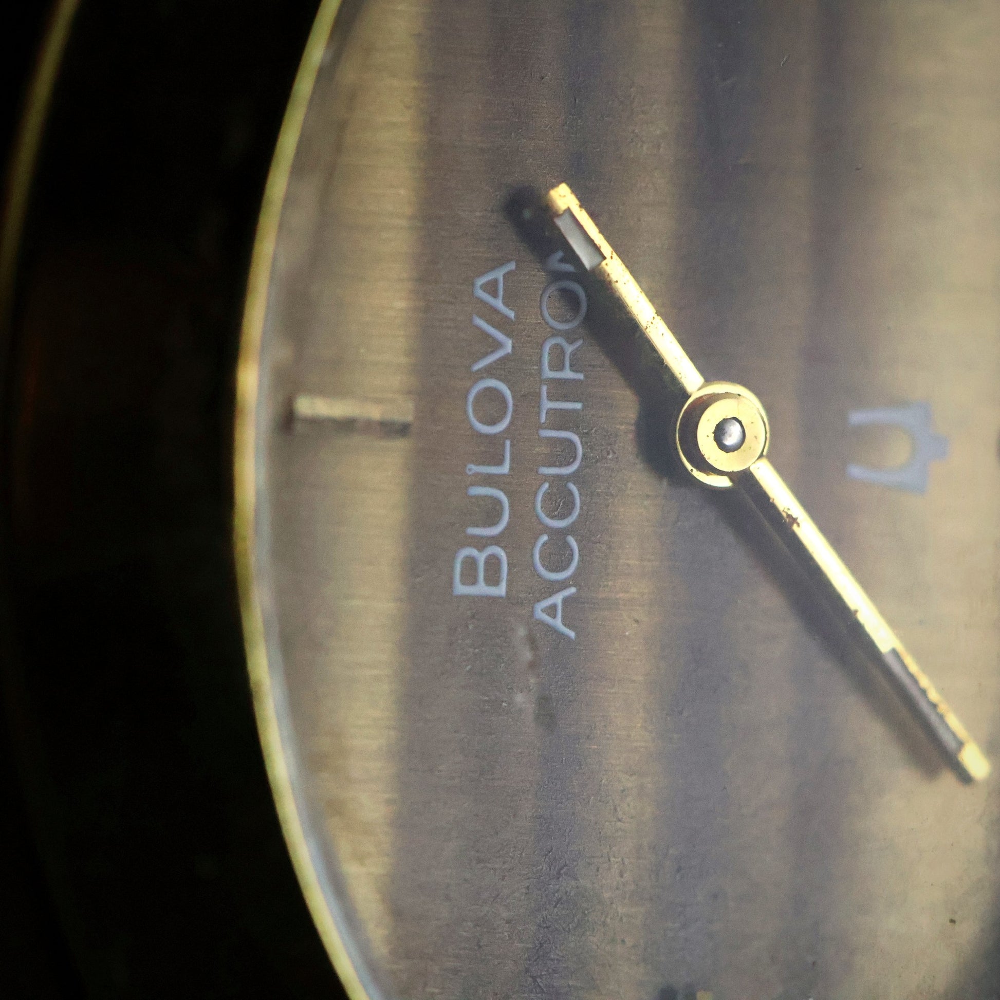 Bulova Accutron | Gold Cuff Bangle | Tigers Eye Style Dial