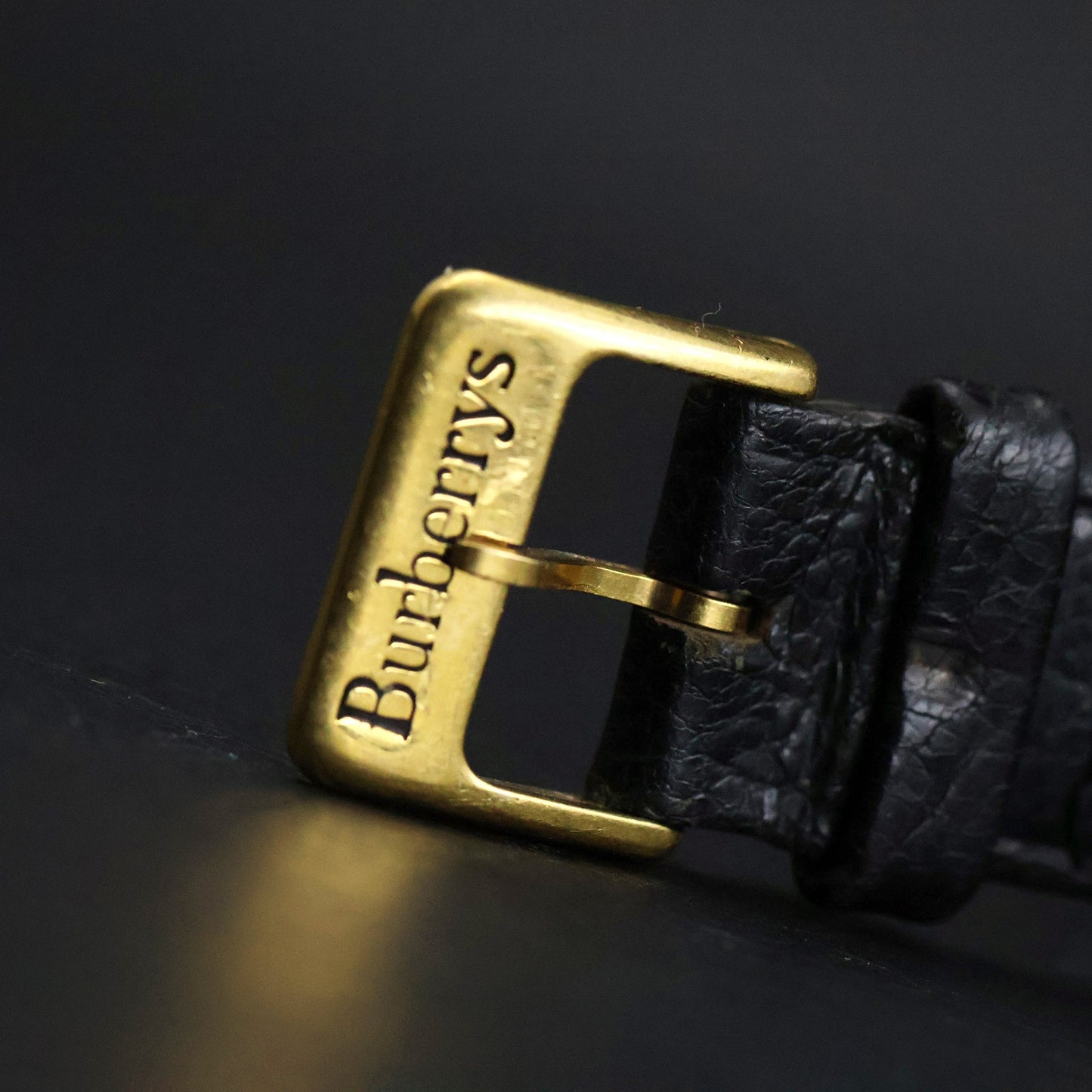 Burberrys London | Gold Round | Engraved Bezel | Black Roman Dial