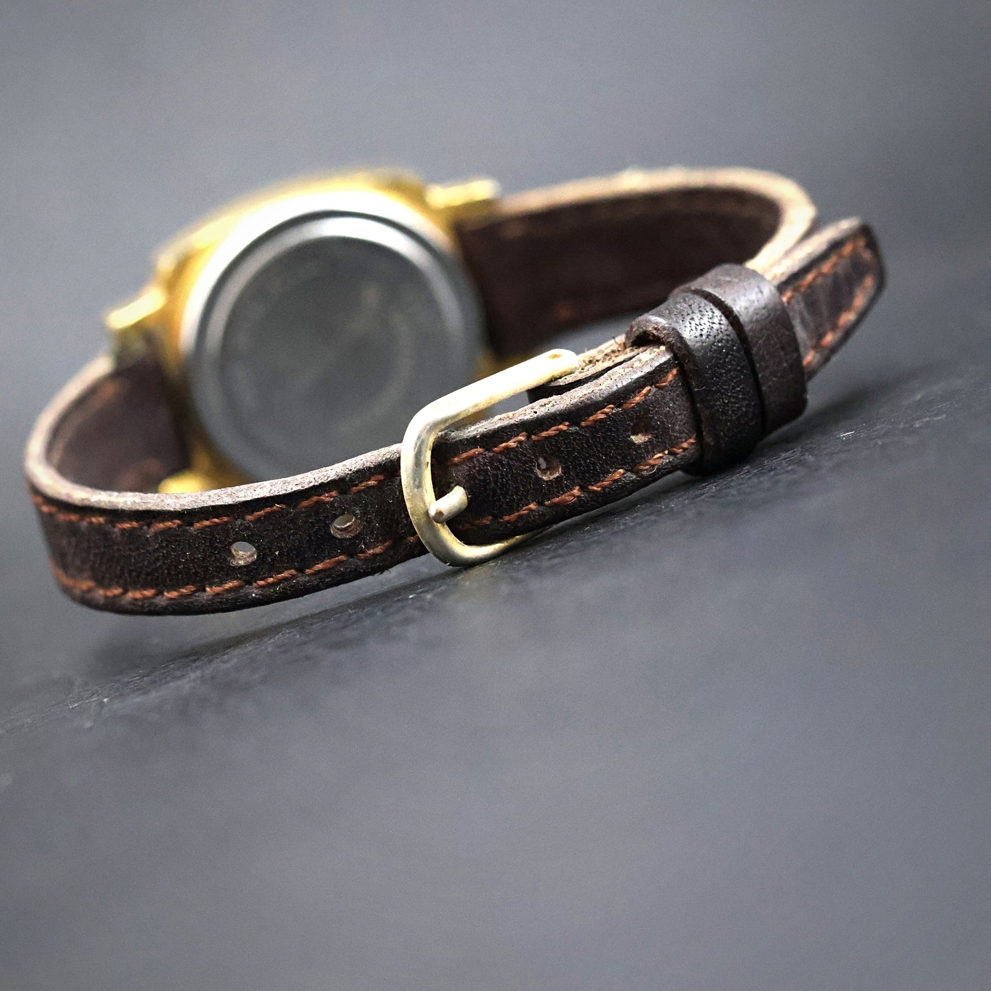 Timex Gold Cushion-Case on Brown Leather