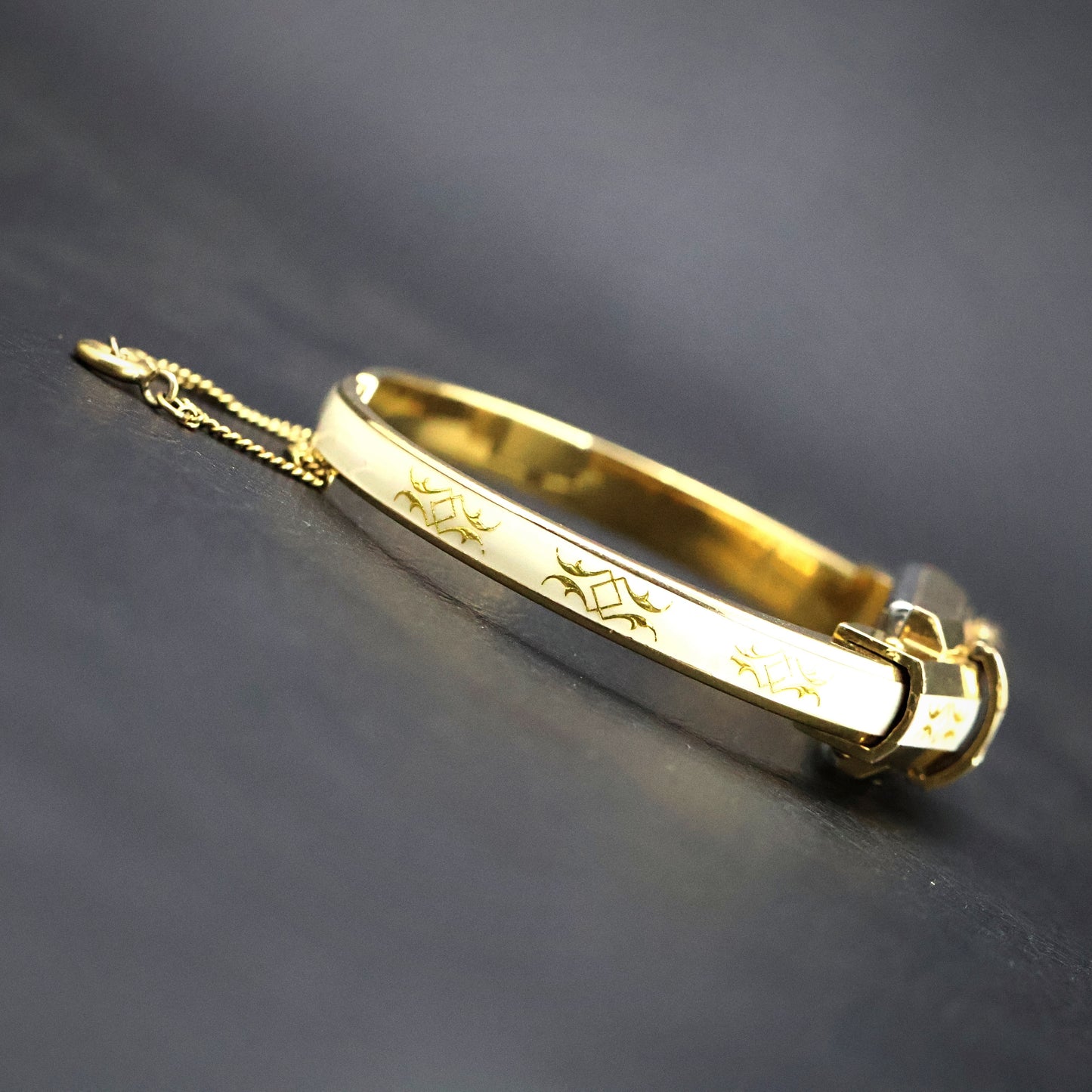 Huguenin White Enamel Gold Scroll Bangle Watch