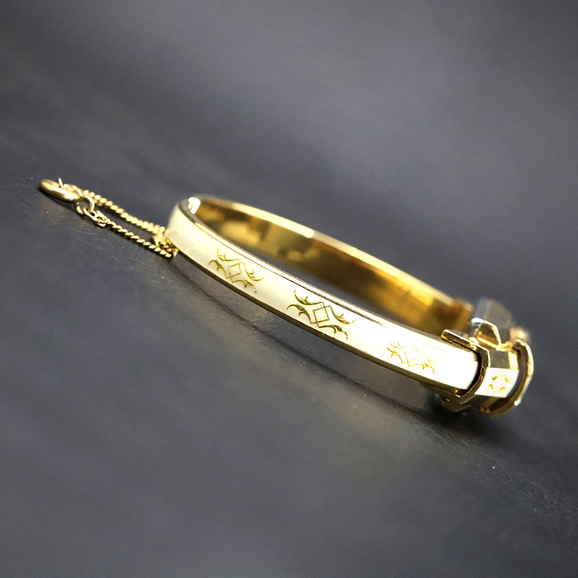 Huguenin White Enamel Gold Scroll Bangle Watch